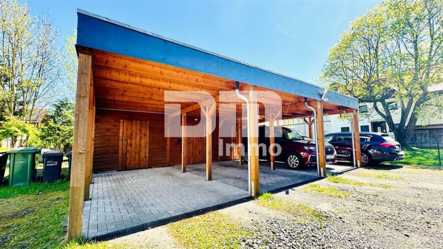 Modernes Familienglück nahe KfW 55-Standard mit Terrasse, Carport und Parkplatz - Carport + Stellplatz